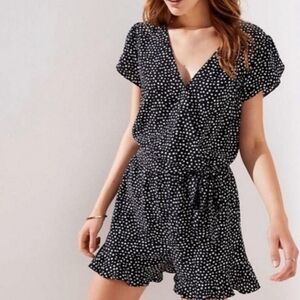 Small black and white polka dot romper